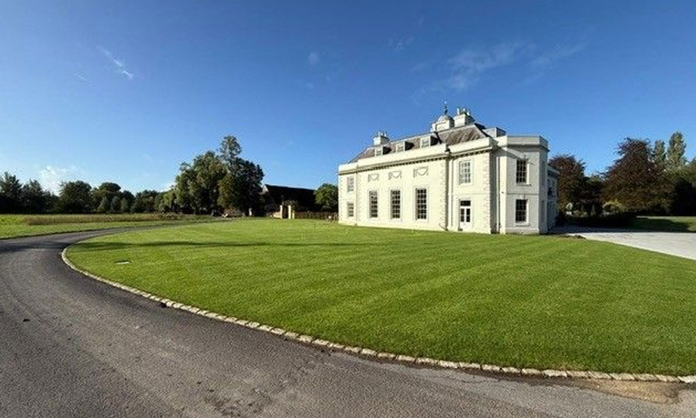 Commercial landscape sprinkler system on lawn grounds